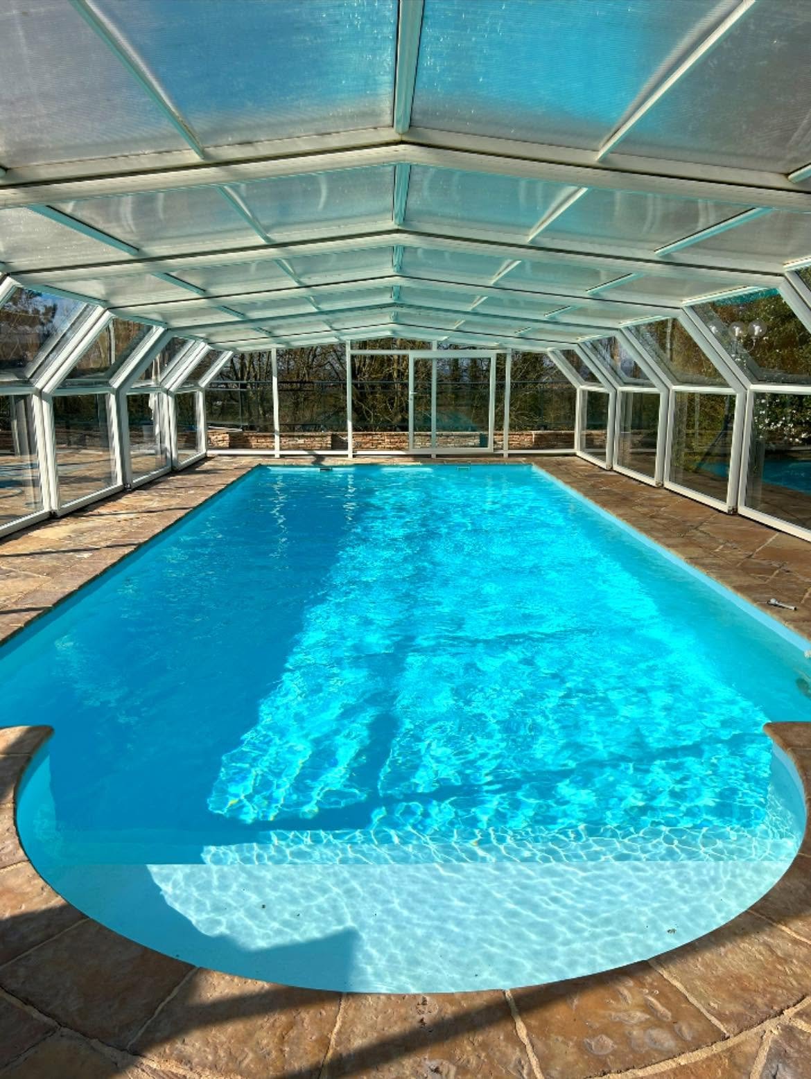 Abri de piscine install&eacute; par Alf Piscine